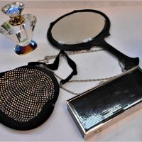 4 x ladies accessories - c1900 Ebony bevelled hand mirror, 1950s black & diamante evening bag, Alannah Hill shoulder evening bag & coloured crystal pe - Sold for $62 - 2019