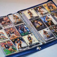 Folder of assorted hand signed sporting trading cards incl VFL, AFL, cricket, etc - Sold for $124 - 2019