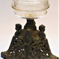 Vintage-cast-and-glass-oil-lamp-base-with-cherub-decoration-Sold-for-62-2019