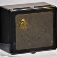 c1930s-Targan-Melbourne-brown-Bakelite-box-with-enamelled-Melbourne-High-emblem-to-top-Honour-The-Work-Sold-for-37-2019