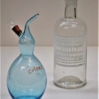 1_2-x-vintage-French-medical-Bottles-pale-blue-Optraex-Du-Docteur-Pierre-with-white-enamelling-Sold-for-43-2019