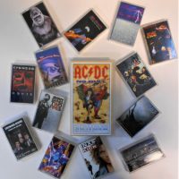 1_Group-lot-Australian-Cassettes-incl-The-Screaming-Jets-INXS-Midnight-Oil-ACDC-incl-live-VHS-Sold-for-68-2019