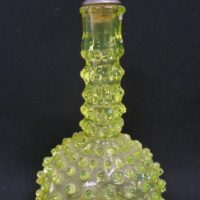 Vintage-Uranium-glass-pouring-bottle-rounded-lower-form-with-raised-dimples-slender-neck-with-textured-banding-and-metal-cork-pourer-approx-23cm-H-Sold-for-93-2019