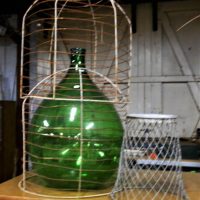 Small-lot-inc-2-x-cages-1-x-large-green-demijohn-and-a-wire-waste-paper-basket-Sold-for-81-2019