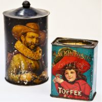 2-x-Confectionery-tins-inc-English-Mackintoshs-Toffee-tin-and-a-tall-embossed-tin-featuring-man-and-woman-in-period-costume-Sold-for-50-2019