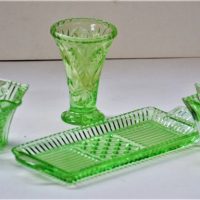 Uranium-glass-tableware-inc-dish-holding-sugar-bowl-milk-pourer-and-small-vase-Sold-for-93-2019