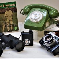 Group-Lot-incl-Minolta-Camera-Rotary-Dial-Green-Phone-Donald-Bradman-How-to-Play-Cricket-Yashima-Toyoko-Binoculars-Collingwood-FC-Poster-Sold-for-87-2019