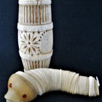 Vintage-Eastern-carved-Bone-novelty-barrel-holder-housing-an-articulated-fish-like-creature-comprising-of-thin-concave-discs-and-attached-head-approx-Sold-for-25-2019