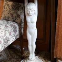 Vintage-style-cast-iron-bird-bath-nude-holding-bowl-with-bird-on-rim-Sold-for-168-2019