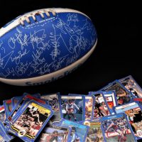 AFL-Kangaroos-Football-with-Facsimile-signatures-and-VFL-Scanlens-Trading-Cards-Sold-for-50-2019