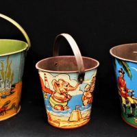 3-x-1950s-Australian-made-tin-sand-Buckets-comical-fish-by-Ace-2-x-Brentoy-Pirate-treasure-comical-animals-Sold-for-193-2019