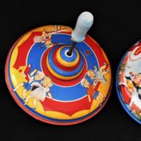 3-x-vintage-colourful-tin-Spinning-Tops-incl-Ace-Australia-feat-children-playing-jungle-animals-etc-Sold-for-87-2019