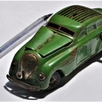 C-1938-SCHUCO-Kommando-Anno-2000-Clockwork-tin-toy-car-with-key-Front-fog-lamp-turns-the-wheels-and-rear-bumper-can-control-speed-and-backwards-forwa-Sold-for-124-2019