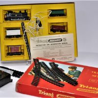 Small-lot-inc-Boxed-TRI-ANG-Train-Set-R3RA-with-engine-track-and-carriages-and-small-case-of-spare-track-pieces-Sold-for-81-2019