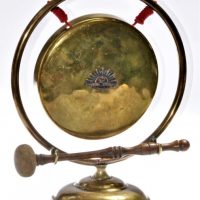 Small-brass-gong-with-mallet-Australian-Armed-Forces-rising-sun-motif-applied-to-front-Sold-for-68-2019