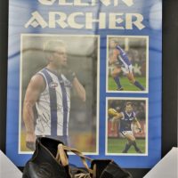 2-x-Australian-Football-related-items-inc-framed-and-signed-Kangaroos-Glenn-Archer-tribute-images-and-a-pair-of-vintage-Arena-leather-footy-boots-Sold-for-68-2019