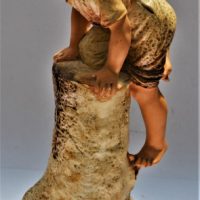 Vintage-1930s-Plaster-Statue-Boy-with-Hat-climbing-Stump-with-Snail-at-base-49cm-H-Sold-for-93-2019