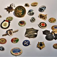 Small-lot-vintage-badges-pins-and-buttons-inc-Victoria-Police-Capstan-Cigarettes-folding-metal-badges-Royal-Life-Saving-Society-medallions-etc-Sold-for-68-2020