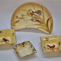 Group-lot-Royal-Doulton-Dishes-incl-Wild-Pansy-D5806-Pin-dish-2-x-Pin-dishes-with-Bird-detail-2-x-Scalloped-raised-rim-plates-Blue-and-Gilt-detail-Sold-for-93-2020