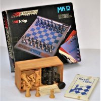 Small-lot-Chess-games-and-pieces-inc-Box-of-polished-boxwood-pieces-KASPAROV-Chess-Computer-Mk12-in-original-box-etc-Sold-for-27-2020