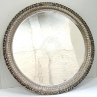 Large reproduction Sheffield plate round serving tray - Sold for $31 - 2016