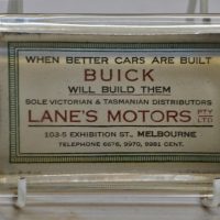 1950s-Buick-Lanes-Motors-Melbourne-glass-advertising-paper-weight-with-mirror-to-base301950s-Buick-Lanes-Motors-Melbourne-advertising-glass-Sold-for-31-2019