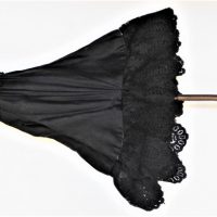 Victorian-black-silk-and-lace-parasol-wooden-bentwood-handle-with-carved-detailing-and-cream-silk-lining-Sold-for-112-2019