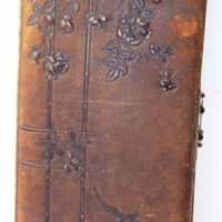 Victorian leather bound PHOTO ALBUM with embossed FLORAL & BIRD decoration to cover - Sold for $67 - 2008
