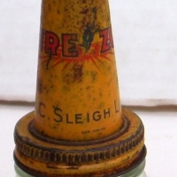 Miniature FIREZONE Oil Bottle by HC Sleigh - plain glass bottle, tin nozzle & cork stopper - Sold for $85 - 2014