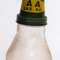 Vintage CASTROL Motor Oil BOTTLE - plain glass one imperial quart bottle - green nozzle with AA SAE 40 text & lid for nozzle - approx 36cm high -  - Sold for $220 - 2014