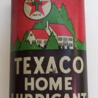 Sml vintage 35ozs TEXACO Home Lubrican TIN by The Texas Co - approx 10cm high with minimal wear to text - Sold for $640 - 2014