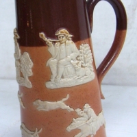 Royal Doulton embossed stoneware 'HARVEST' jug with pewter lid & applied decoration - 17cms high - Sold for $92 - 2014