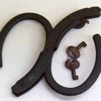 Vintage cast iron HANDCUFFS with 2 x keys marked J Knight & Co - Sold for $146 - 2014