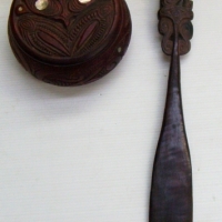 2 x carved wooden MAORI items - wooden box with inlaid shell & small paddle with decorative carved figure to top - Sold for $433 - 2014