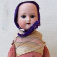 Armand Marseille 370 bisque shoulder head doll with open mouth, sleep eyes, cloth body composition hands - 28 cms tall - Sold for $104 - 2014