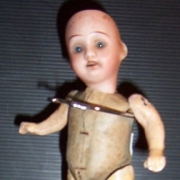 Small German bisque DOLL - stiff cardboard body with pinned composition arms & legs - sleep eyes, open mouth - wig missing - marked to back of head '2 - Sold for $55 - 2014