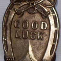 Victorian pressed metal LETTER HOLDER with horse shoe & 'GOOD LUCK' to front - Sold for $122 - 2014
