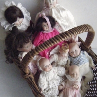 Basket of porcelain Girl and Baby DOLLS - incl Reproduction and Victorian Style, Painted Features, Wigs and Glass Eyes, Soft Bodies, H16-35cm - Sold for $55 - 2008