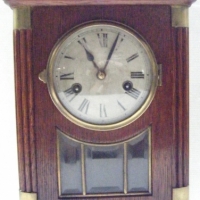 German Coronet wooden Mantle clock, oak case, some wear to dial, complete with key - Sold for $104 - 2008