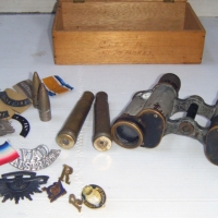 Group lot Vintage Australian MILITARY items - incl Enamel Badges, Medal Ribbons, Rising Sun and other badges, spent ammunition, field glasses etcixed millarae - Sold for $73 - 2008