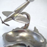 Heavy chromed dish in the shape of map of Australia with attached SPITFIRE - Sold for $146 - 2008