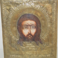 Vintage RUSSIAN Religious ICON - Handpainted Portrait of Christ surrounded by ornate pressed brass, Russian text to lower section, 31 x 275cm - Sold for $396 - 2008