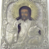Vintage RUSSIAN Religious ICON - Handpainted Portrait of Saint surrounded by ornate pressed tin and brass, timber backed, Russian text to middle secti - Sold for $415 - 2008