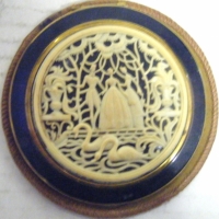 Vintage KIGU POWDER COMPACT with Raised & Pierced Ivorine Classical Scene to Lid, with original cloth cover, Made in England - Sold for $104 - 2008