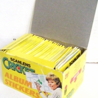 1983/84 Scanlens CRICKET album Sticker BOX with approx 500 stickers - featuring David Hooks on lid - Sold for $171 - 2008