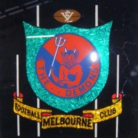 Vintage VFL MELBOURNE Demons FOOTBALL CLUB Foil Picture in original white shadow box frame, 25 x 20cm - Sold for $61 - 2008