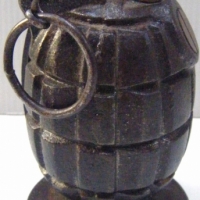 TRENCH ART Table CIGARETTE LIGHTER made from cWWII Pineapple Hand Grenade - Sold for $207 - 2009