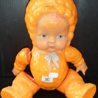 1930's celluloid BABY wearing bright orange jumpsuit with hood - made in Japan - 30 cms L - a/f - Sold for $55 - 2009