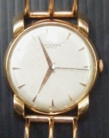 Vintage gents gold UNIVERSAL wrist WATCH with unusual  gold wire bracelet - working - Sold for $659 - 2009