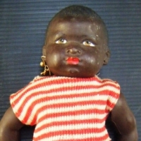 Vintage French PETITCOLIN Black CELLULOID DOLL with h/painted facial features, marked to back, L19cm - Sold for $73 - 2009